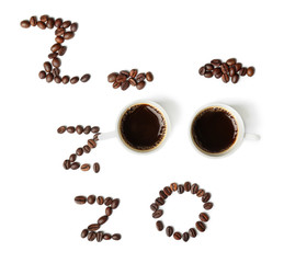 Composition with cups of coffee and roasted beans on white background