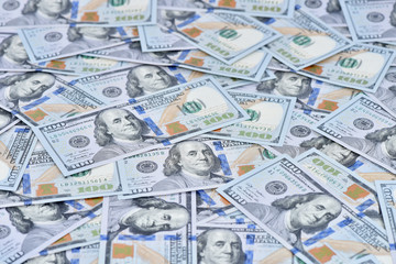 Texture of money. Dollars are scattered. A large amount of banknotes.