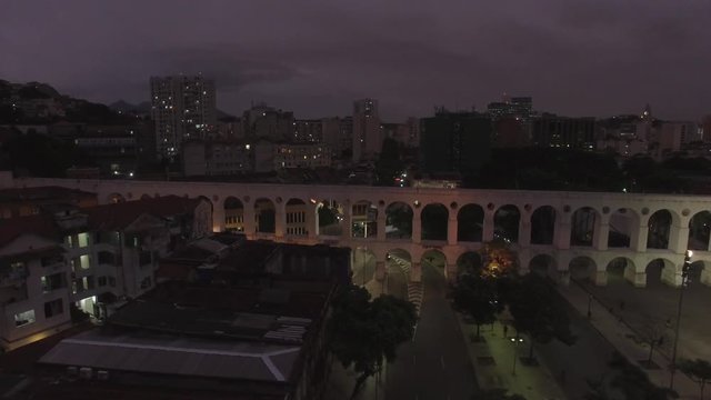 Night drone flying in rio de janeiro at arcos da lapa