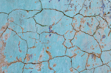 Obraz premium The texture of the old wall with destroyed plaster