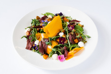 tasty salad with pumpkin