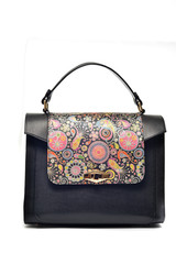 Fashionable black leather purse isolated on white