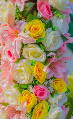 Group of flowers with artificial bright colors like natural real