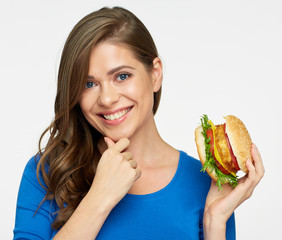Smiling woman holding cheeseburger isolated portrait