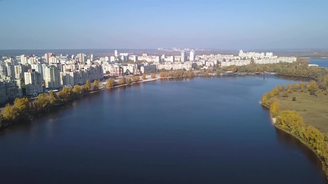 Aerial: Island on Dnipro river in Obolon district of Kiyv, autumn time