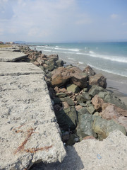 Seascape. Rocks on the beach.