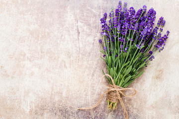 Lavender flowers, bouquet on rustic background, overhead.