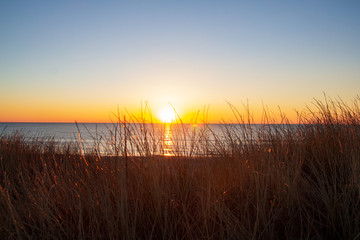 D&uuml;nen und Meer im Sonnenuntergang