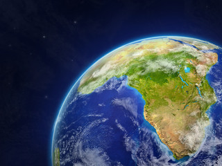 Africa on model of planet Earth with very detailed planet surface and clouds.