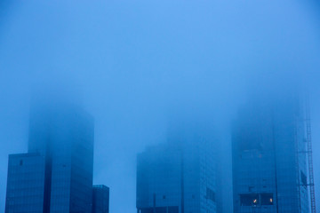 city ​​and fog
