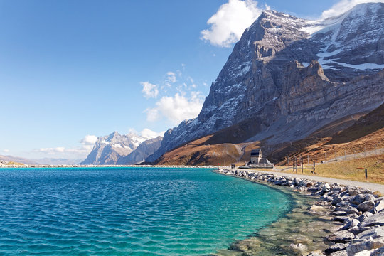 View of Eigernordwand (Eiger Northface) and Wetterhorn massif from Fallboden station and Fallbodensee (Fallboden lake) - Fallboden, Jungfrau Region, Switzerland