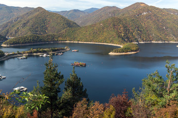 Naklejka premium Panoramic Autumn ladscape of The Vacha (Antonivanovtsi) Reservoir, Rhodope Mountains, Plovdiv Region, Bulgaria