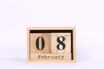 Wooden cubes calendar with the date of February 08. Concept calendar for year with copy space isolated on white background
