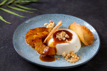 Panna cotta with caramelised pineapple and coconut biscuit