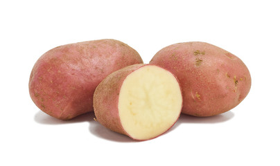 fresh potato tubers on white background