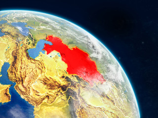 Kazakhstan from space on realistic model of planet Earth with country borders and detailed planet surface and clouds.