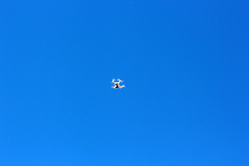 Drone fly in the blue sky