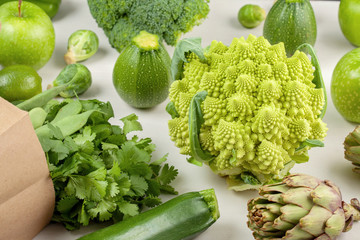 Top view of fresh organic vegetables in green color. Healthy eating concept in different seasons. Organic agriculture, farming, shopping