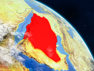 Saudi Arabia from space on realistic model of planet Earth with country borders and detailed planet surface and clouds.