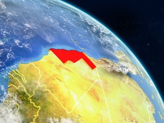 Western Sahara from space on realistic model of planet Earth with country borders and detailed planet surface and clouds.
