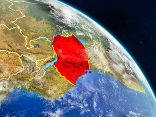 Tanzania from space on realistic model of planet Earth with country borders and detailed planet surface and clouds.