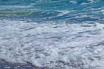 Texture foamed azure wave, selective focus