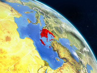 Greece from space on realistic model of planet Earth with country borders and detailed planet surface and clouds.