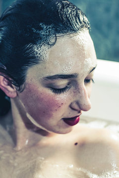 Sensual wet woman with red lips