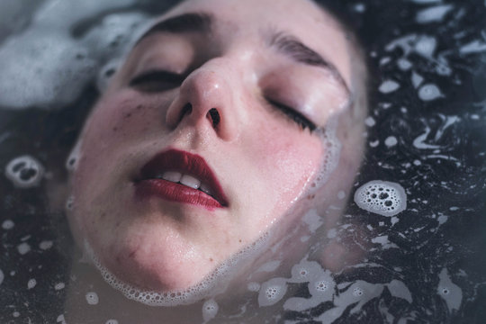 Sensual wet woman with red lips