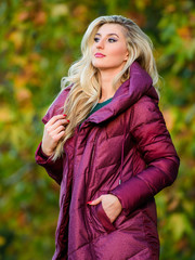 Professional stylist advice. Woman wear extra volume jacket. Girl fashionable blonde walk autumn...