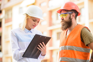 Successful deal concept. Foreman established supply of building materials. Expert and builder communicate about supply building materials. Purchase of building materials. Construction industry