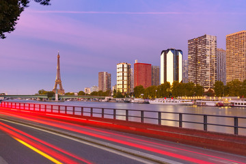 Paris cityscape with Eiffel tower, quay de Grenelle and Seine river at sunset, Paris,France.