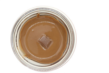 Aerial view of melted chocolate in glass jar