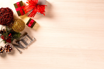 Christmas decorations and ornament on wooden background. View from above