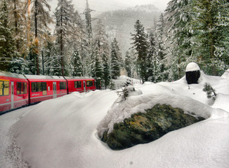 Bernina Express train, Switzerland - 01 november 2018: People sitting on the Bernina express train and admiring the scenic view on the Swiss alps; Bernina Express train, Switzerland - 01 november 2018