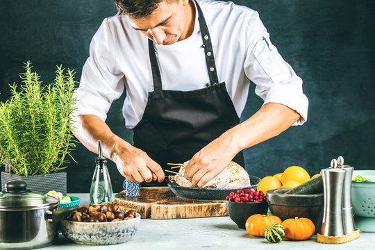 Chef preparing stuffed duck