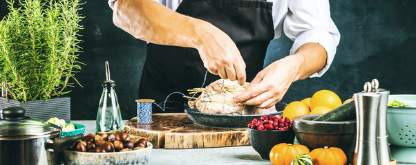 Chef preparing stuffed duck
