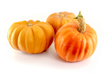 Three pieces pumpkins isolated on white background