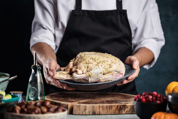 Chef preparing stuffed duck