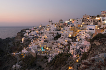 Obraz premium sunset on the island of Santorini, view of the Oia.