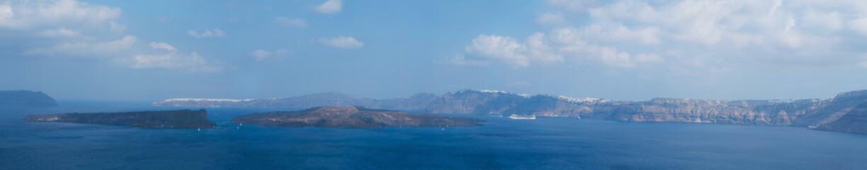 Fototapeta na wymiar wide panorama of Santorini island with Nea Kameni island
