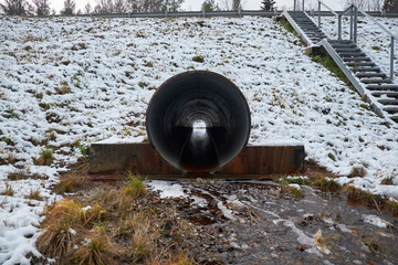 stream in the pipe under the road