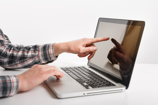 Laptop with man hand isolated