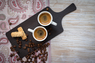 Two espresso with cookies ...