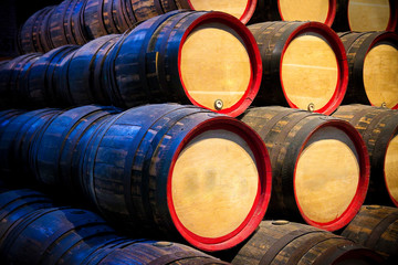 Wooden beer barrels stacking one on the other