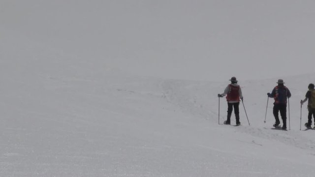 People walking in a snow mountain