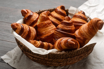 Wicker basket of fresh croissants