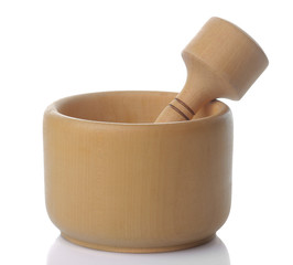 Wooden mortar on a white isolated background. close-up. kitchen accessories