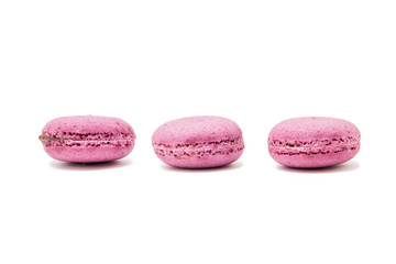 Delicious macaroons on white background