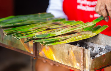 Thai desserts on charcoal stove © chaiviewfinder